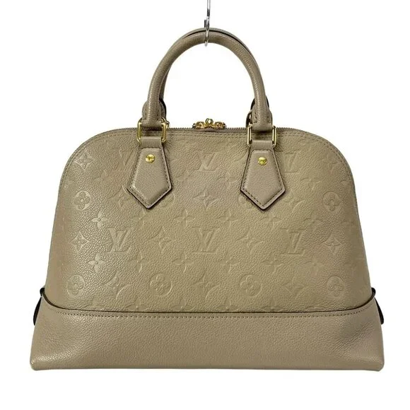 LOUIS VUITTON NeoAlma Tourterelle Monogram Empreinte Handbag - Picture 2 of 15